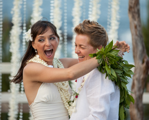 The brides share a laugh