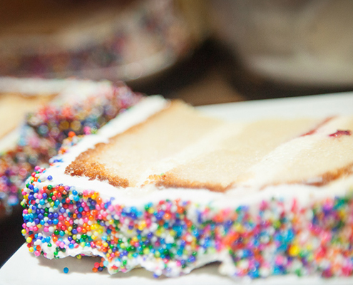 slice of cake with colorful sprinkles